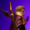 Detalje af den gyldne stav med vinget top