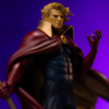 Adam Warlock statue med rød kappe og gylden stav