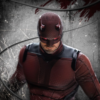Daredevil statue i en mørk scene